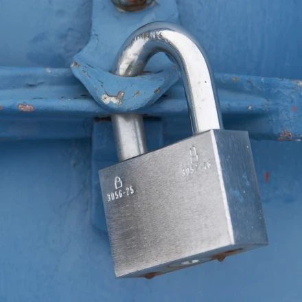Padlock on a cargo container door — cargo theft prevention in trucking