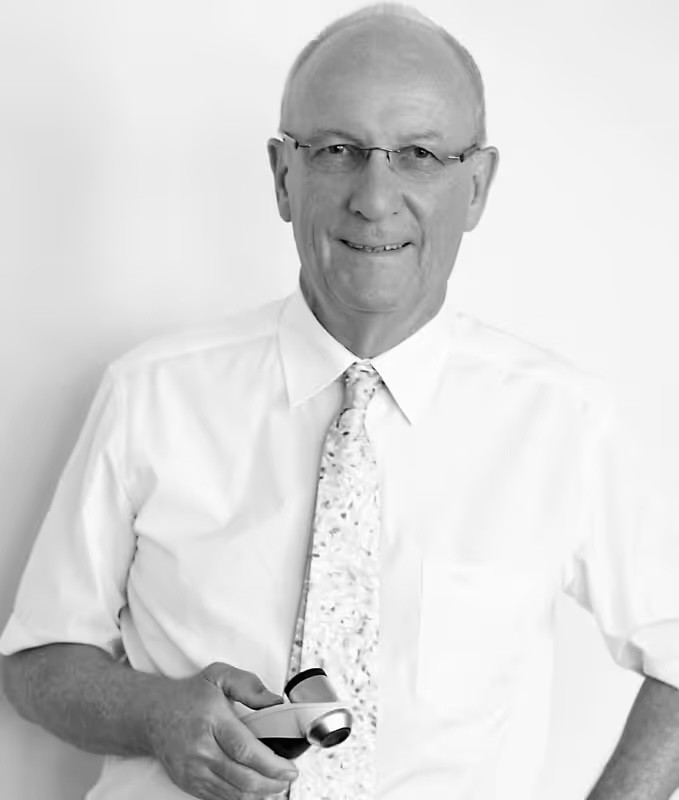 woman in white crew neck shirt smiling