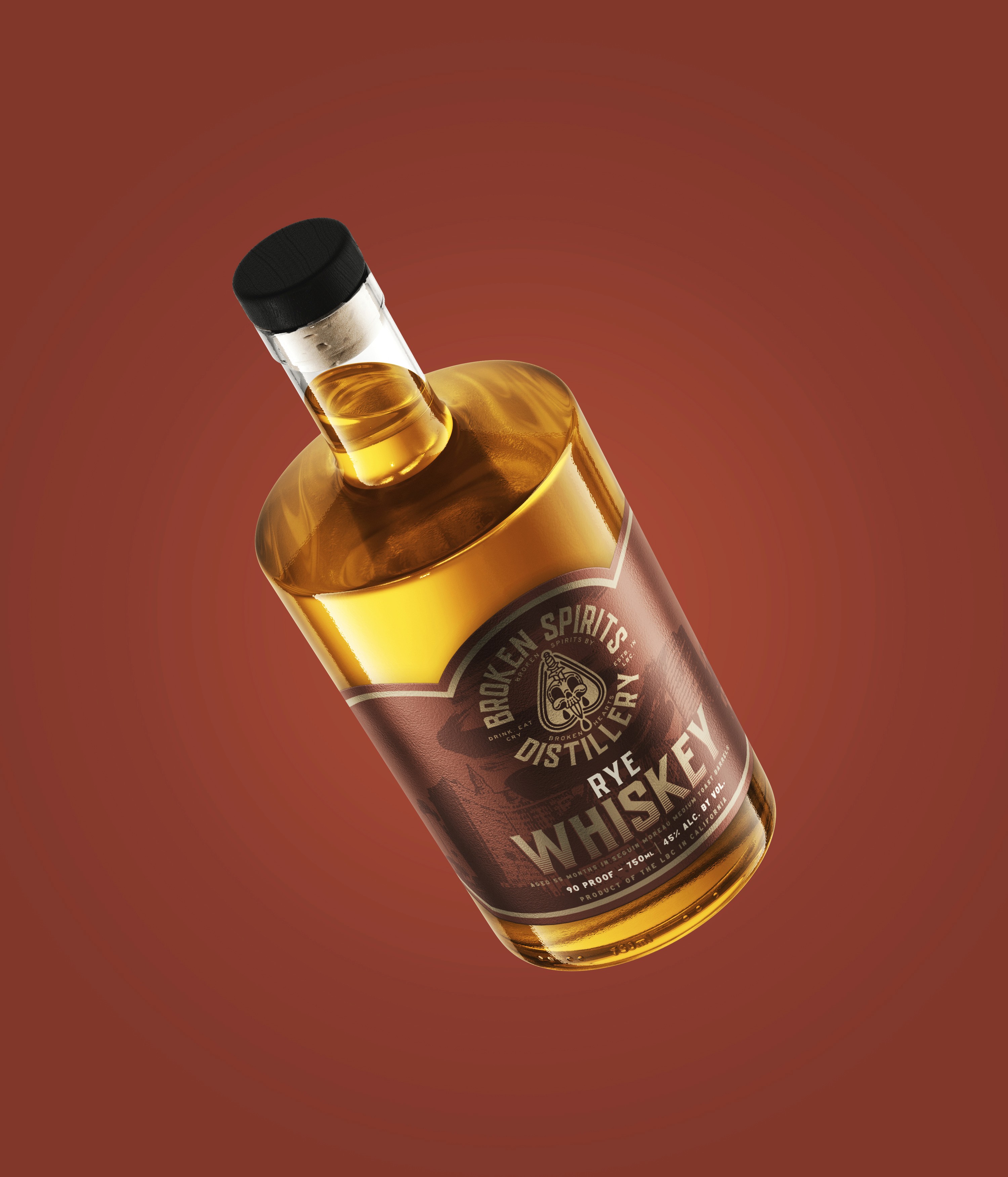 Broken Spirits whiskey bottle with red-toned background
