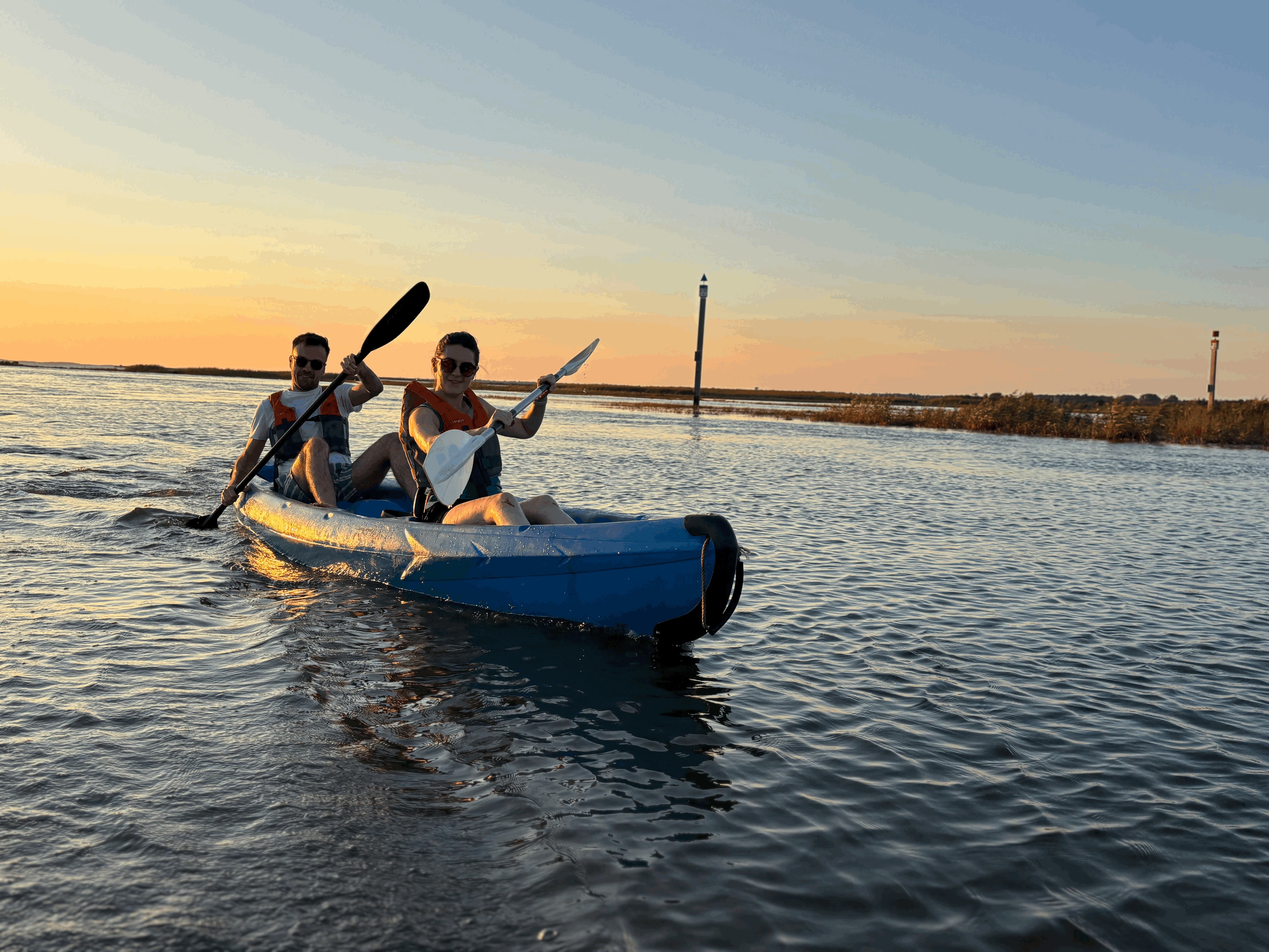 A man standing with Sufboard