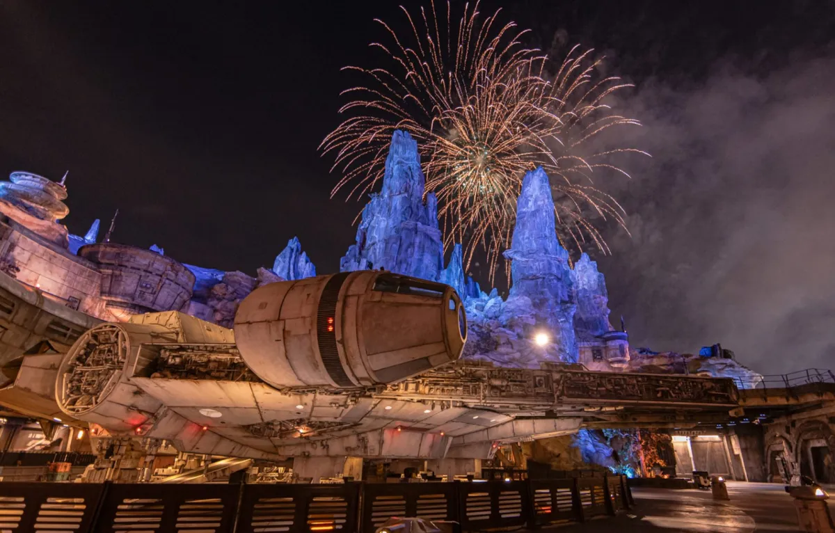 Fireworks over the mountains of Batuu and the Millennium Falcon at Galaxy's Edge in Disneyland