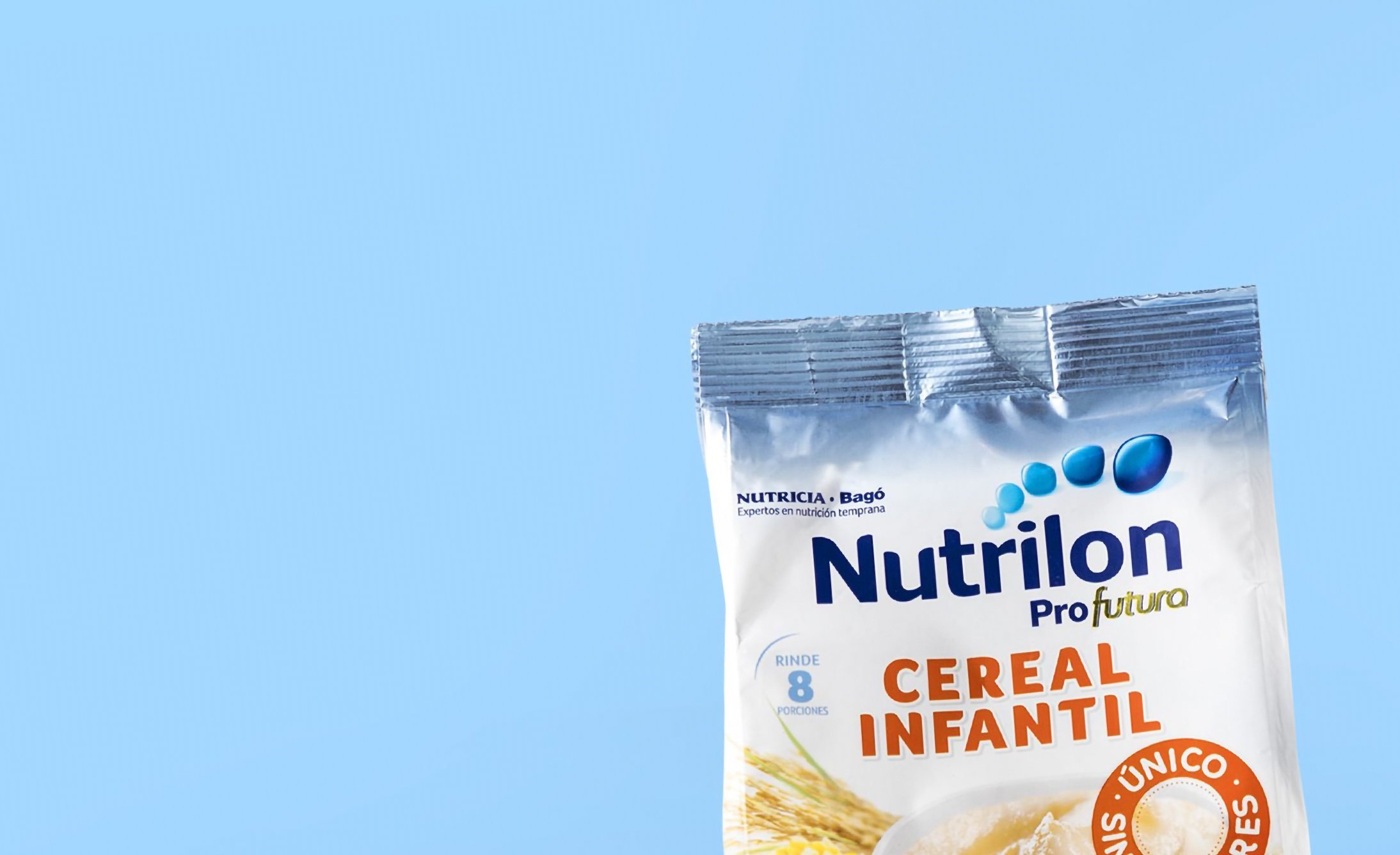 The image shows a package of Nutrilon Profutura Cereal Infantil against a light blue background. The package features text about servings and unique nutrients.