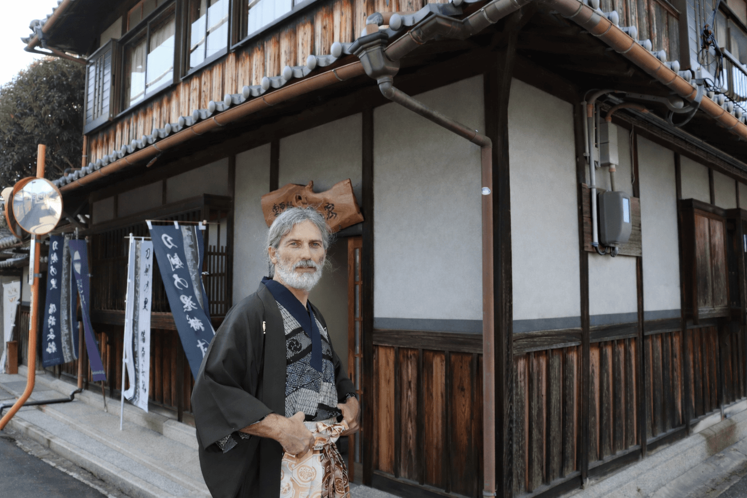 Swordsmiths hammering iron in a team