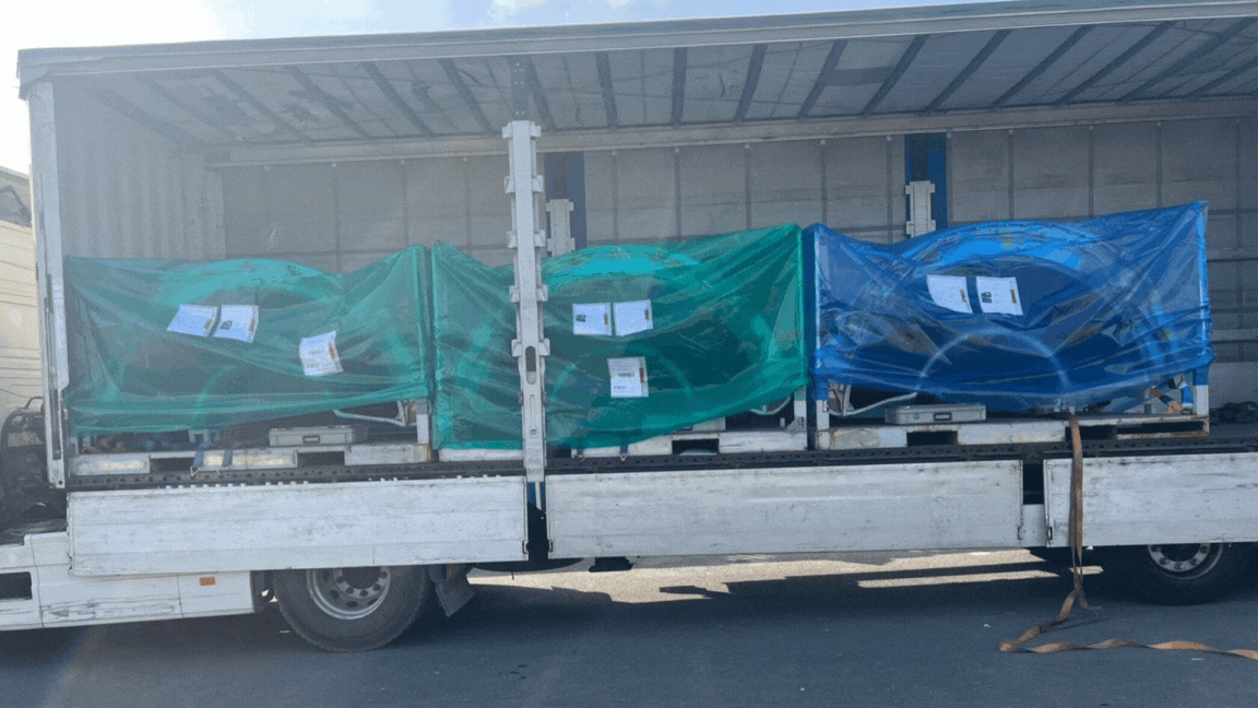 Stacked shipping containers.