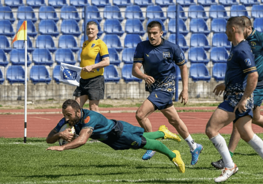 photo of montenegrin fly-half diving on the try area