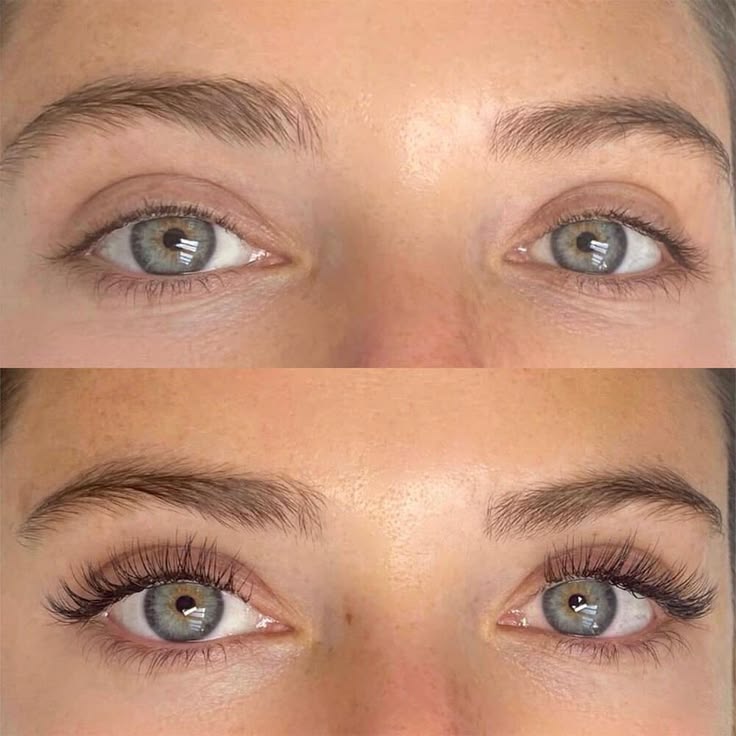Woman looking up and smiling, showing lash extensions in profile.