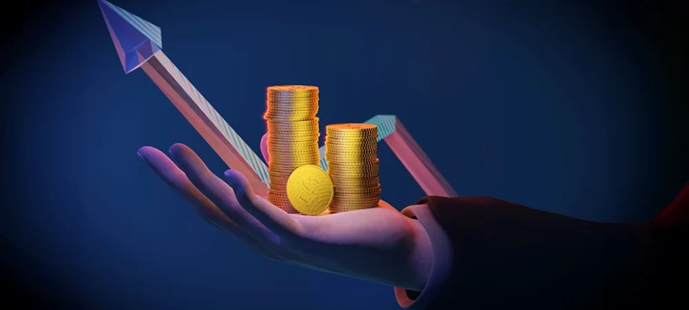 Hand holding coins