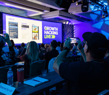 A Man Talking using Microphone in the Conference Room