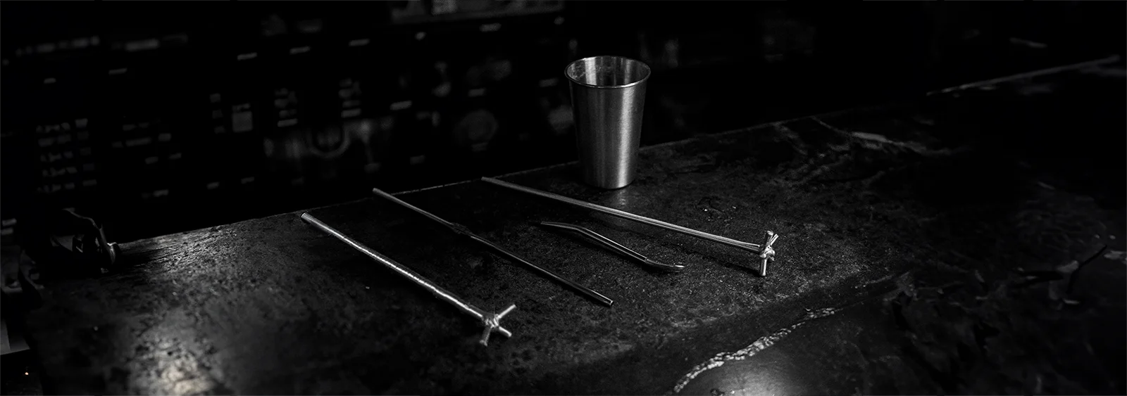 Two chefs behind the kitchen counter