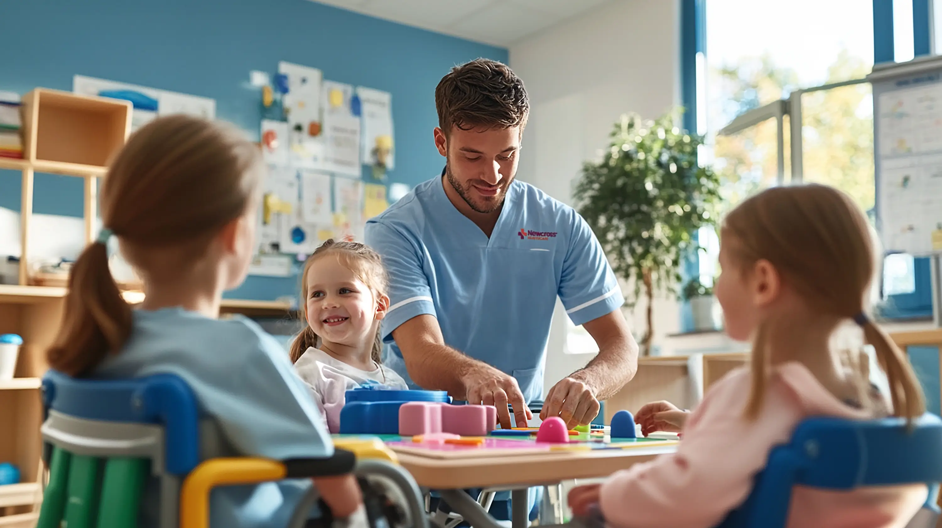 Male Newcross care worker in a school