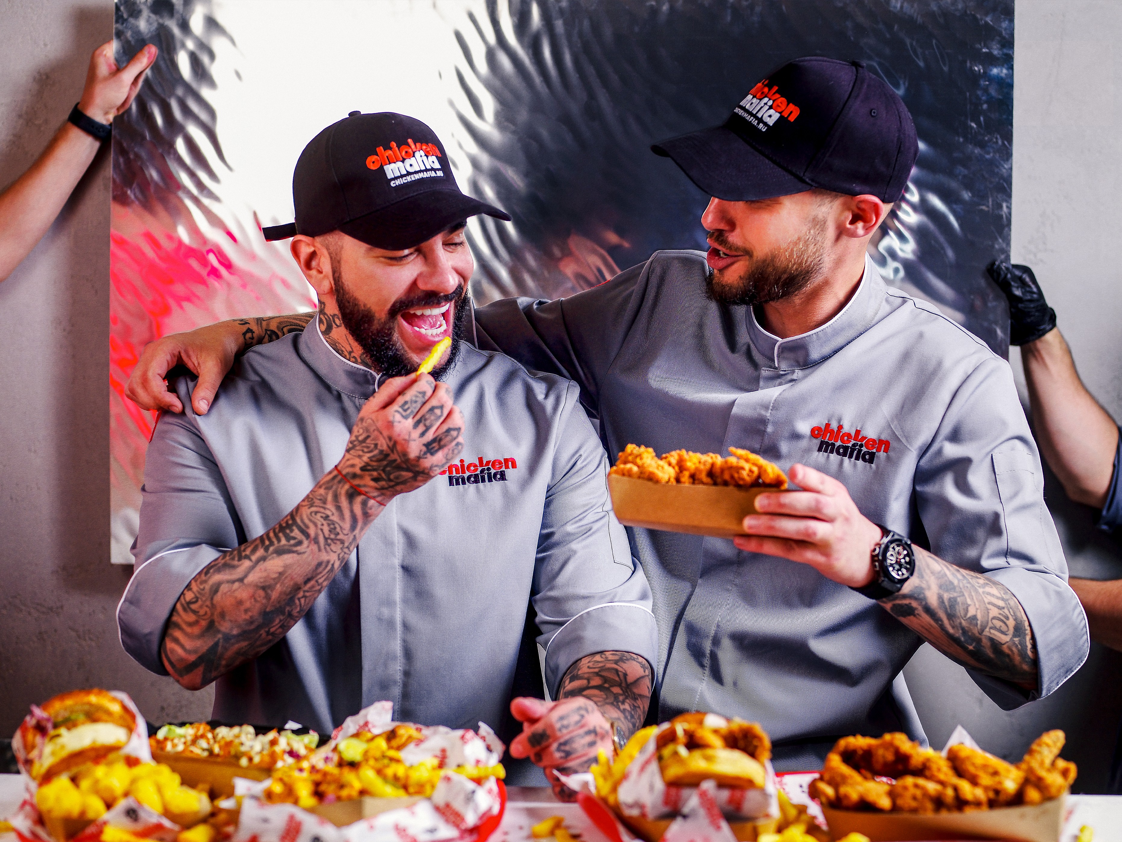 Batch.Works logo over a photo of a box of 3D printed objects