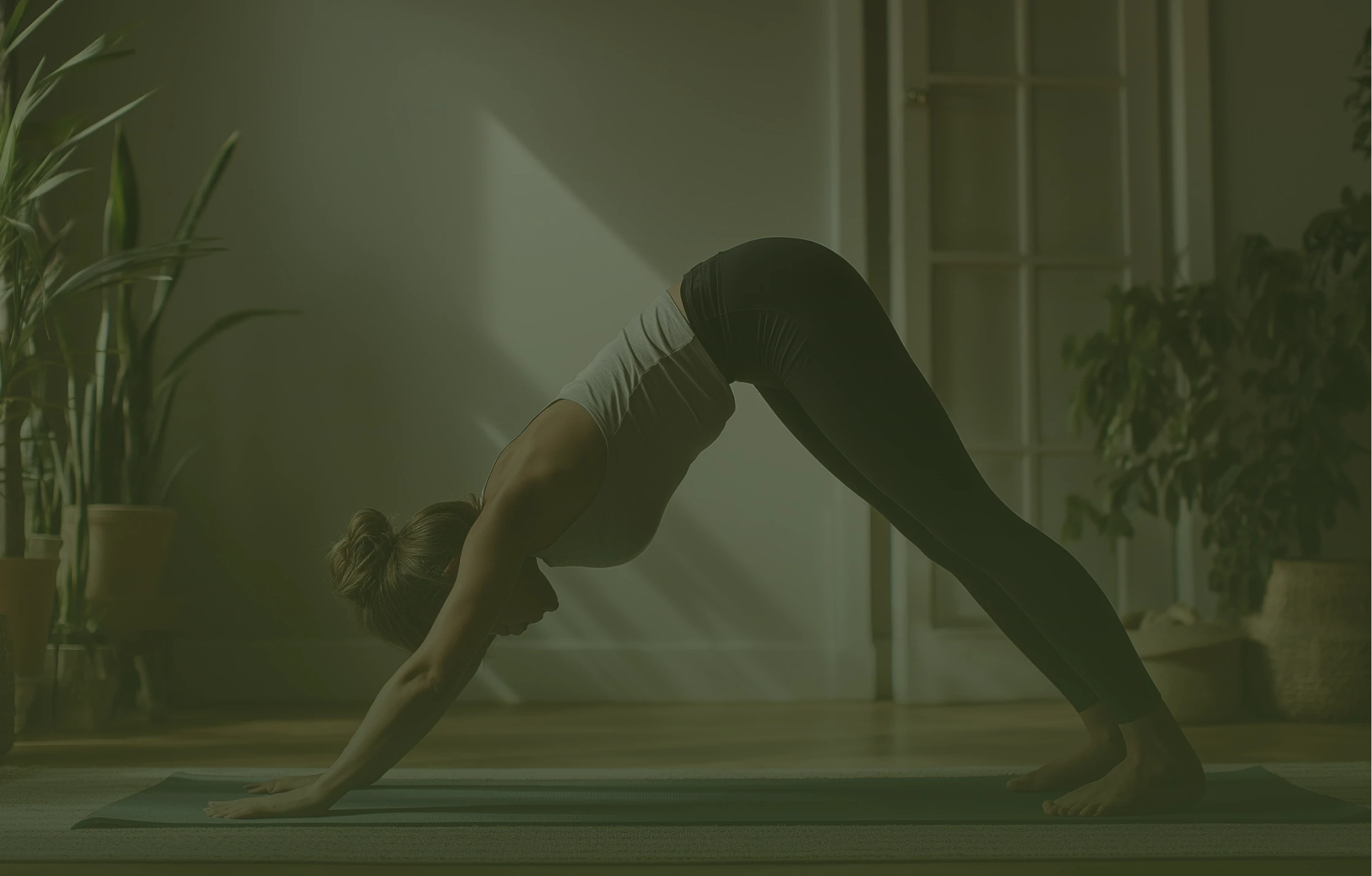 Woman practicing yoga at home