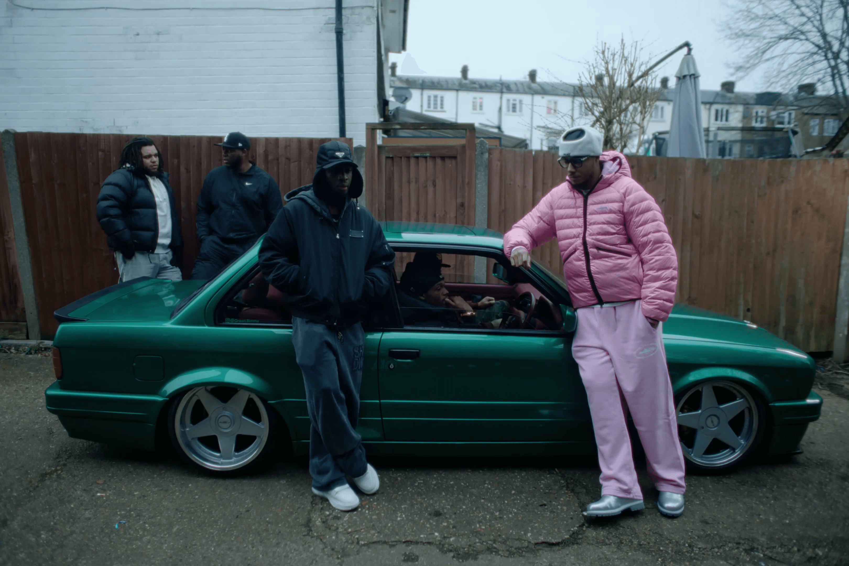 Modern architectural walkway with angled roof and sunlight.