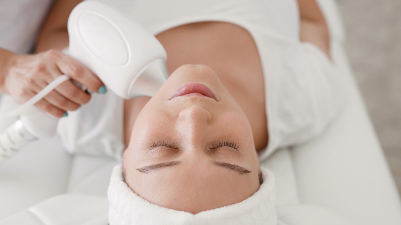 Woman undergoing laser treatment for hyperpigmentation