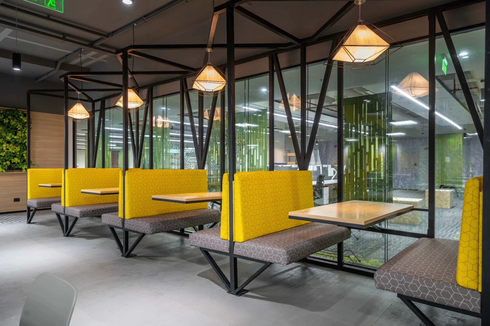 Booth seating design for cafeteria of a workspace keeping in mind space planning