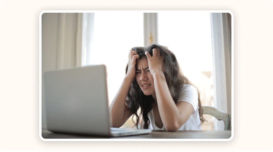 Frustrated user staring at laptop — symbol of plugin-related problems