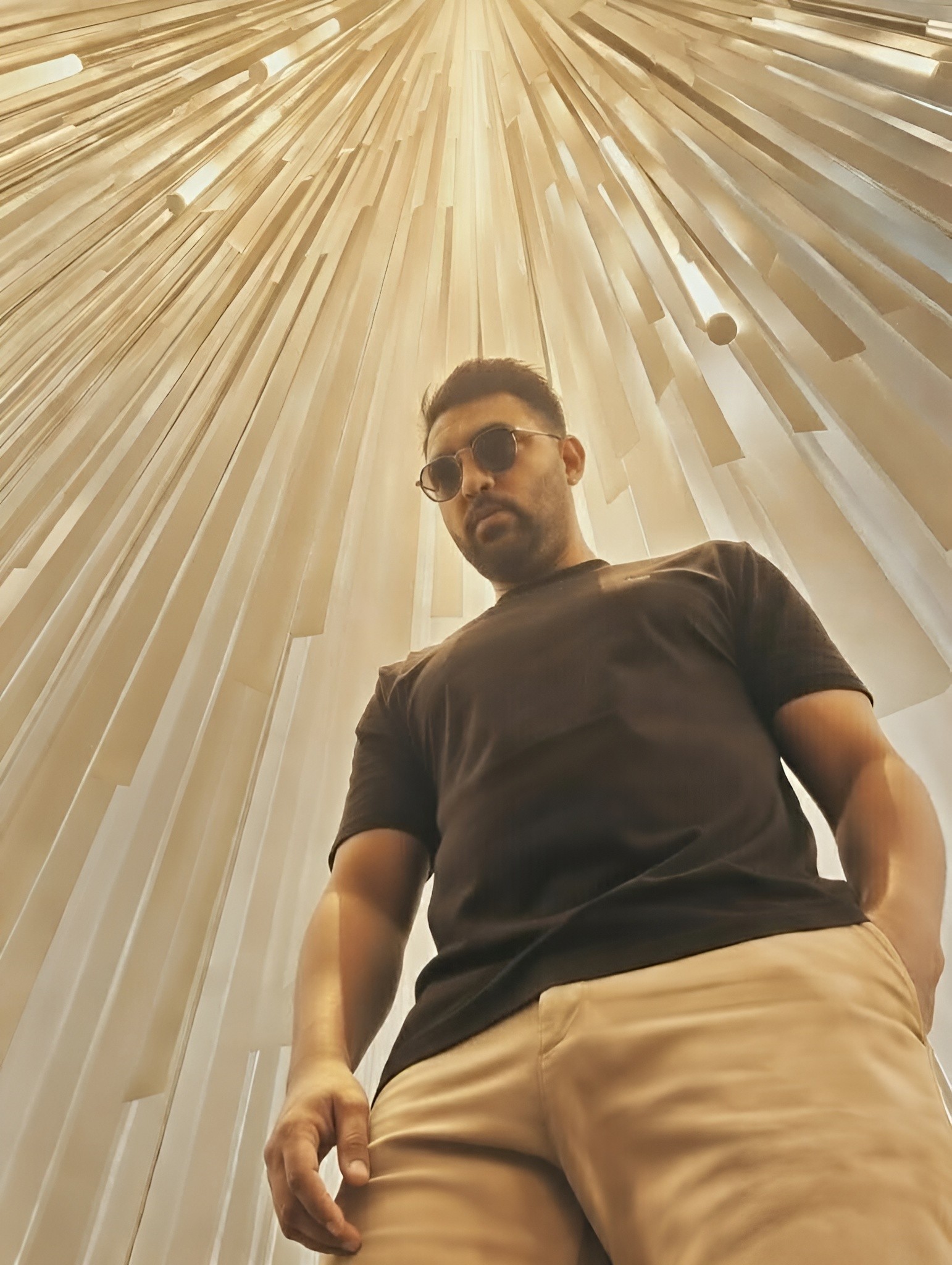 Music producer sitting in his studio