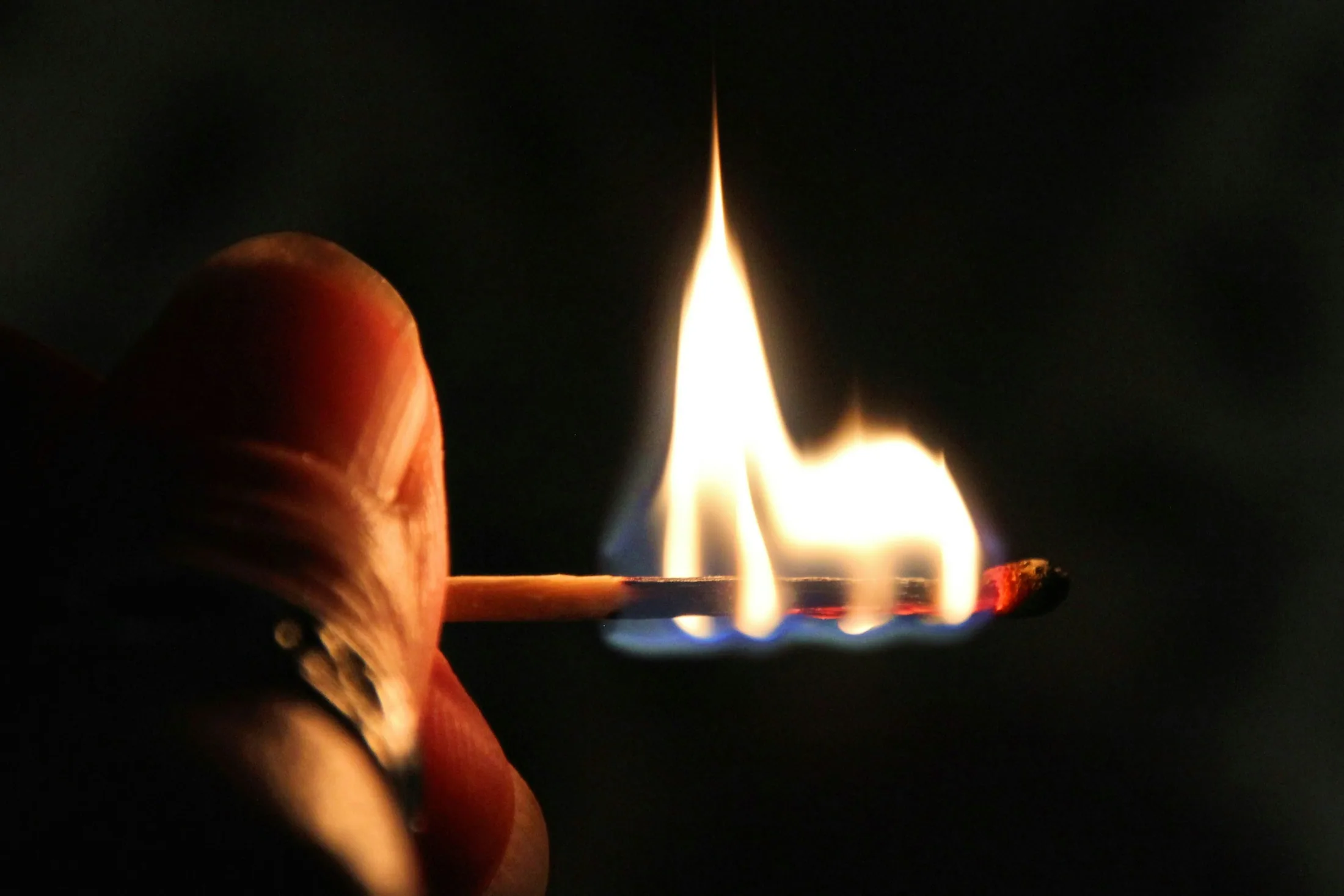 A lit match