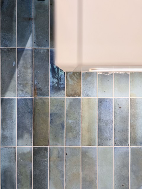 Image of KHD Homes bathroom tile design with construction and interior design elements for luxurious home renovations.