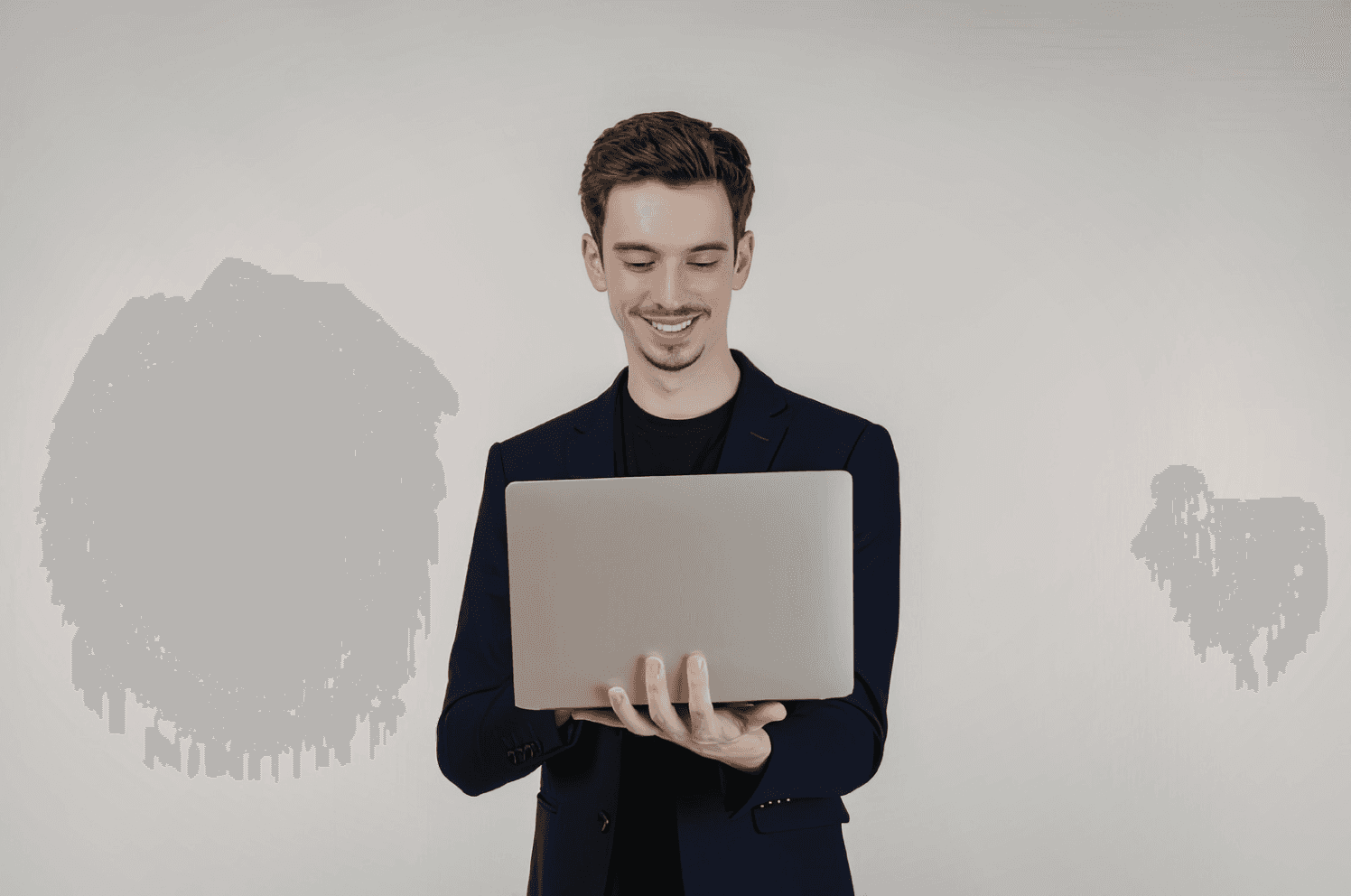 Man analyzing Amazon advertising performance on a laptop, representing campaign optimization and cost efficiency strategies.