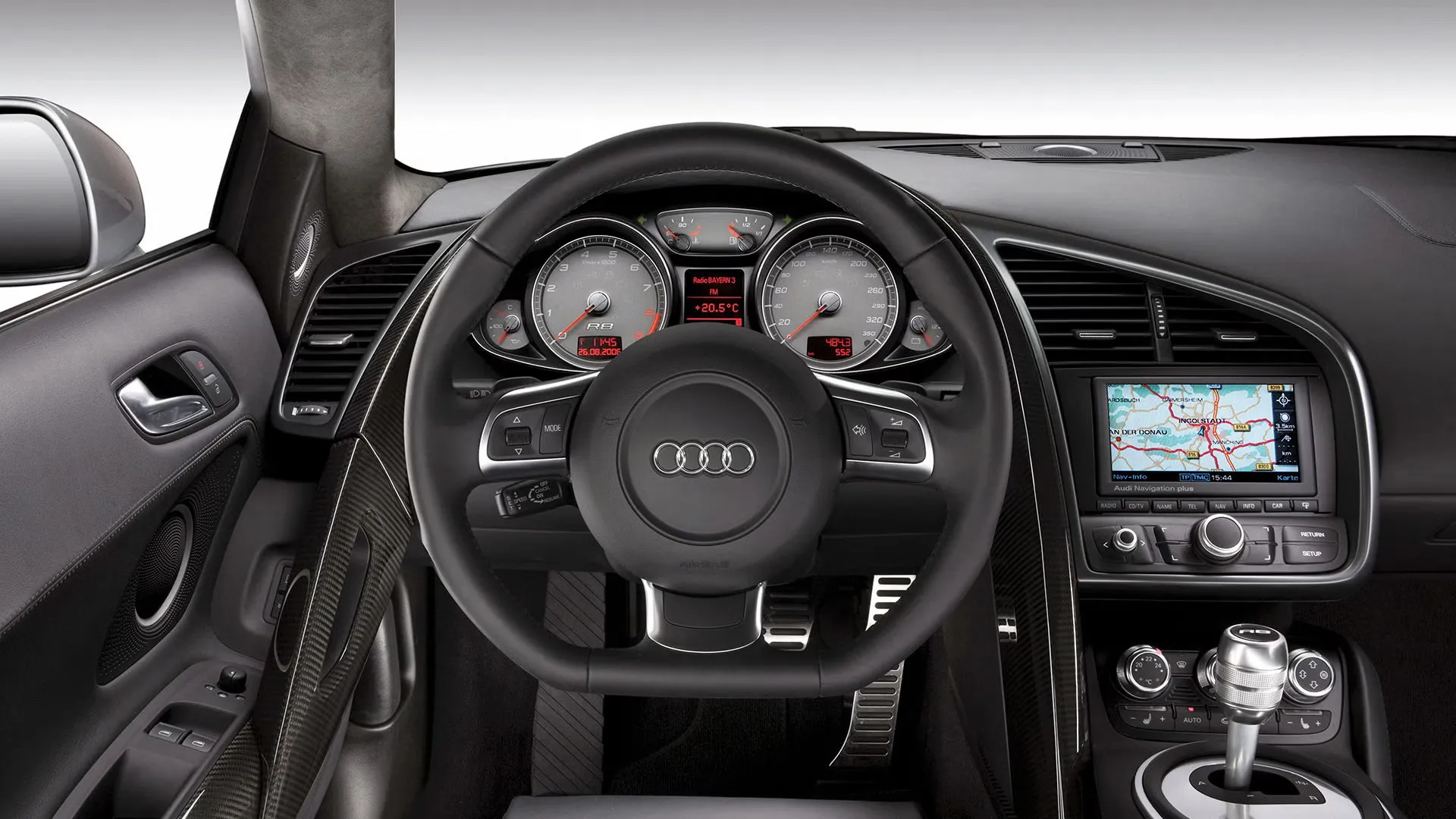 Supercar interior dashboard and steering wheel