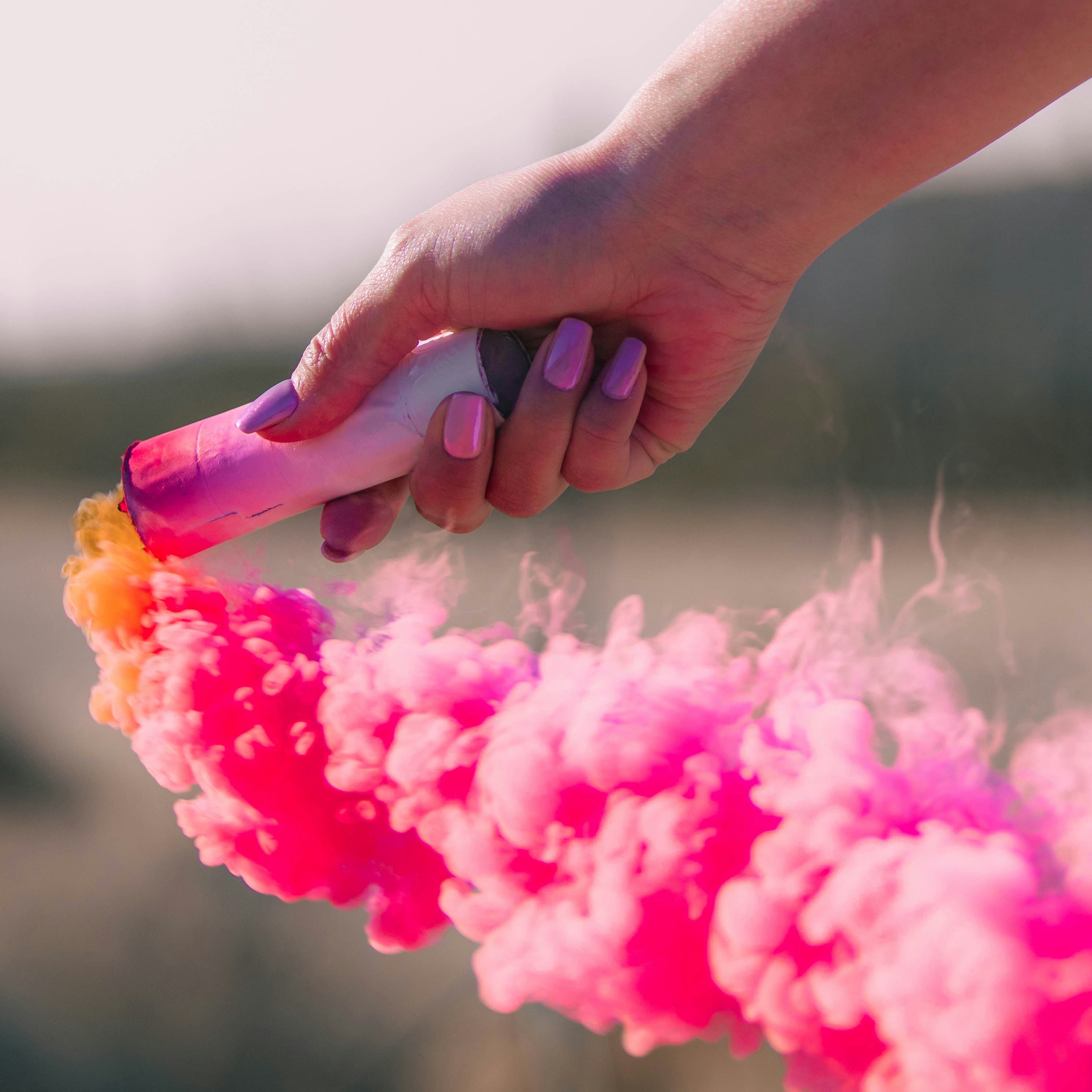 holding color smoke