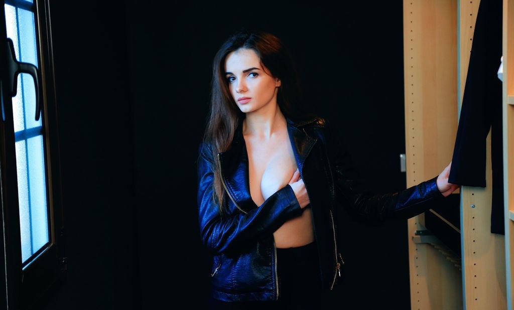 kids lying on a glass land and smiling