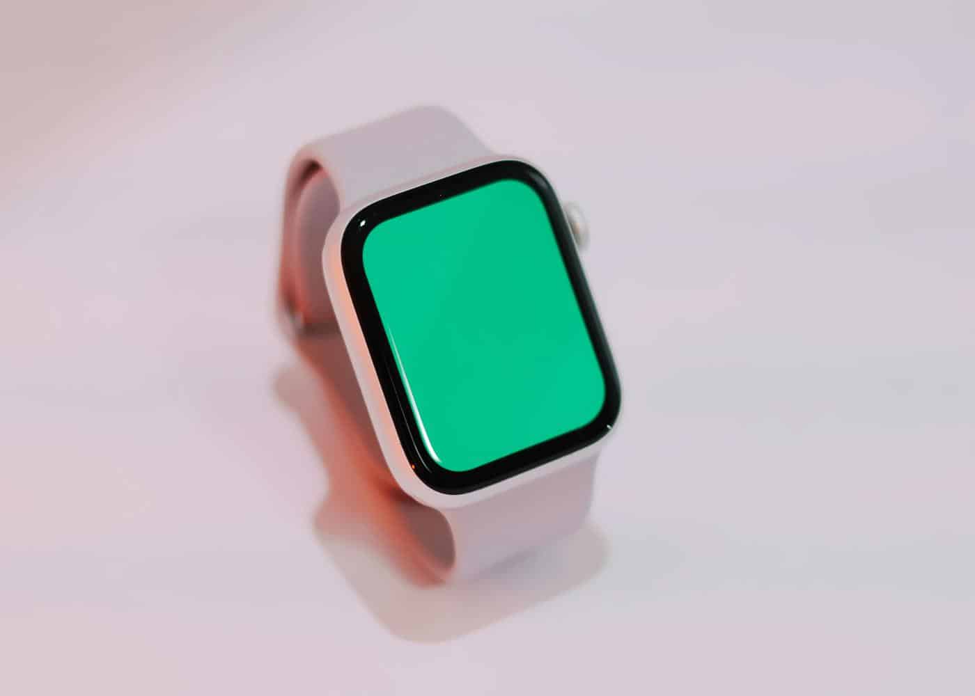 An Apple Watch showing a green screen