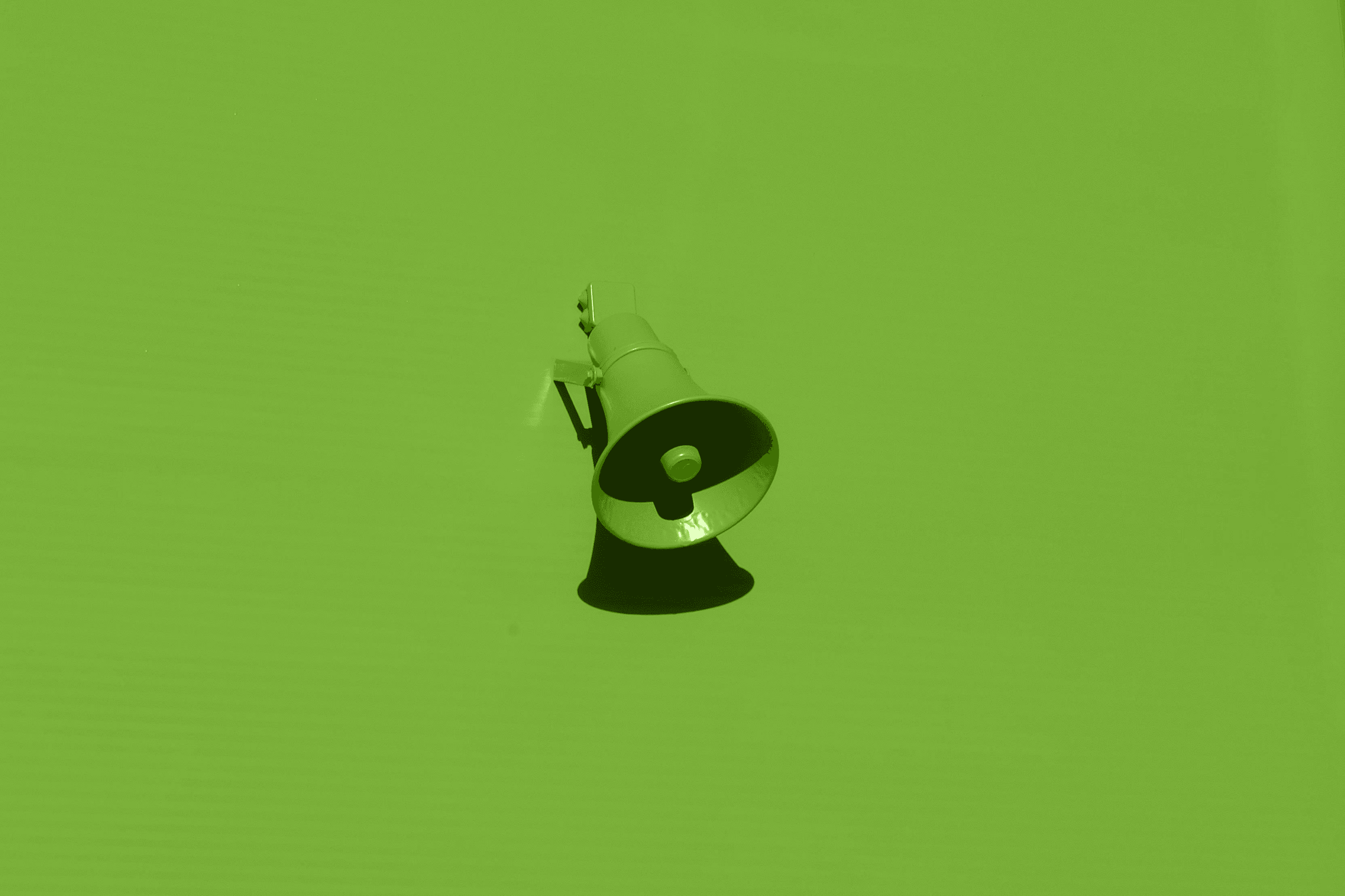 orange megaphone on orange wall