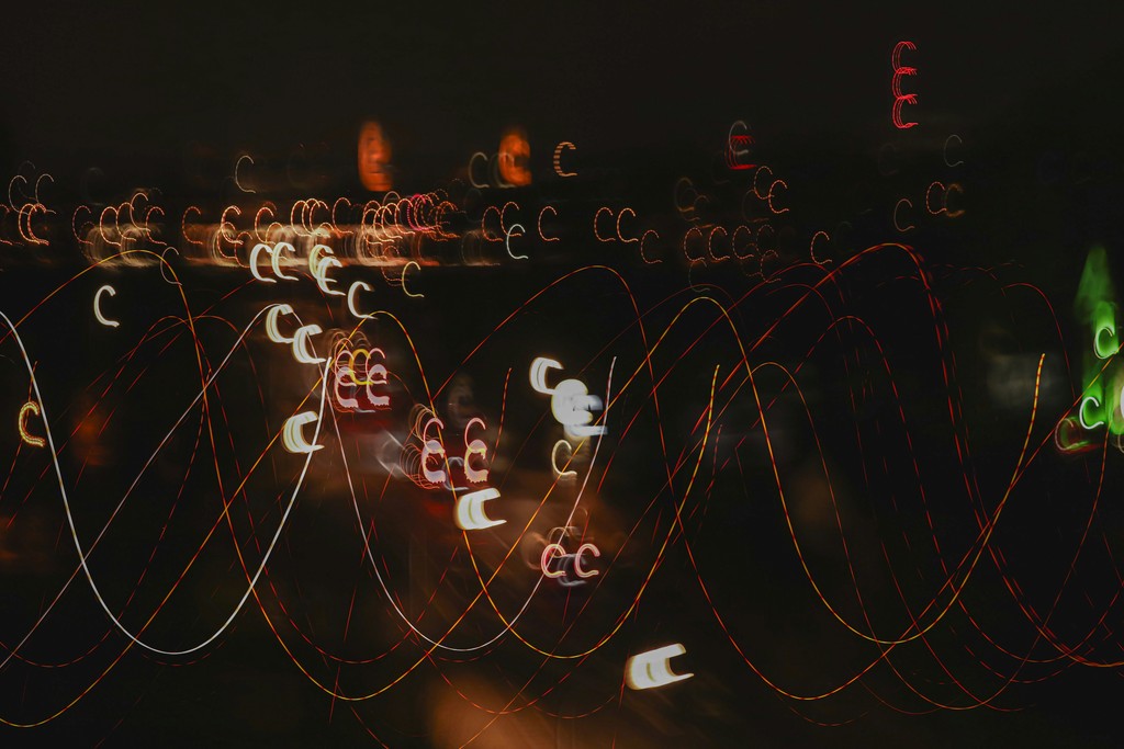 a blurry photo of a city at night