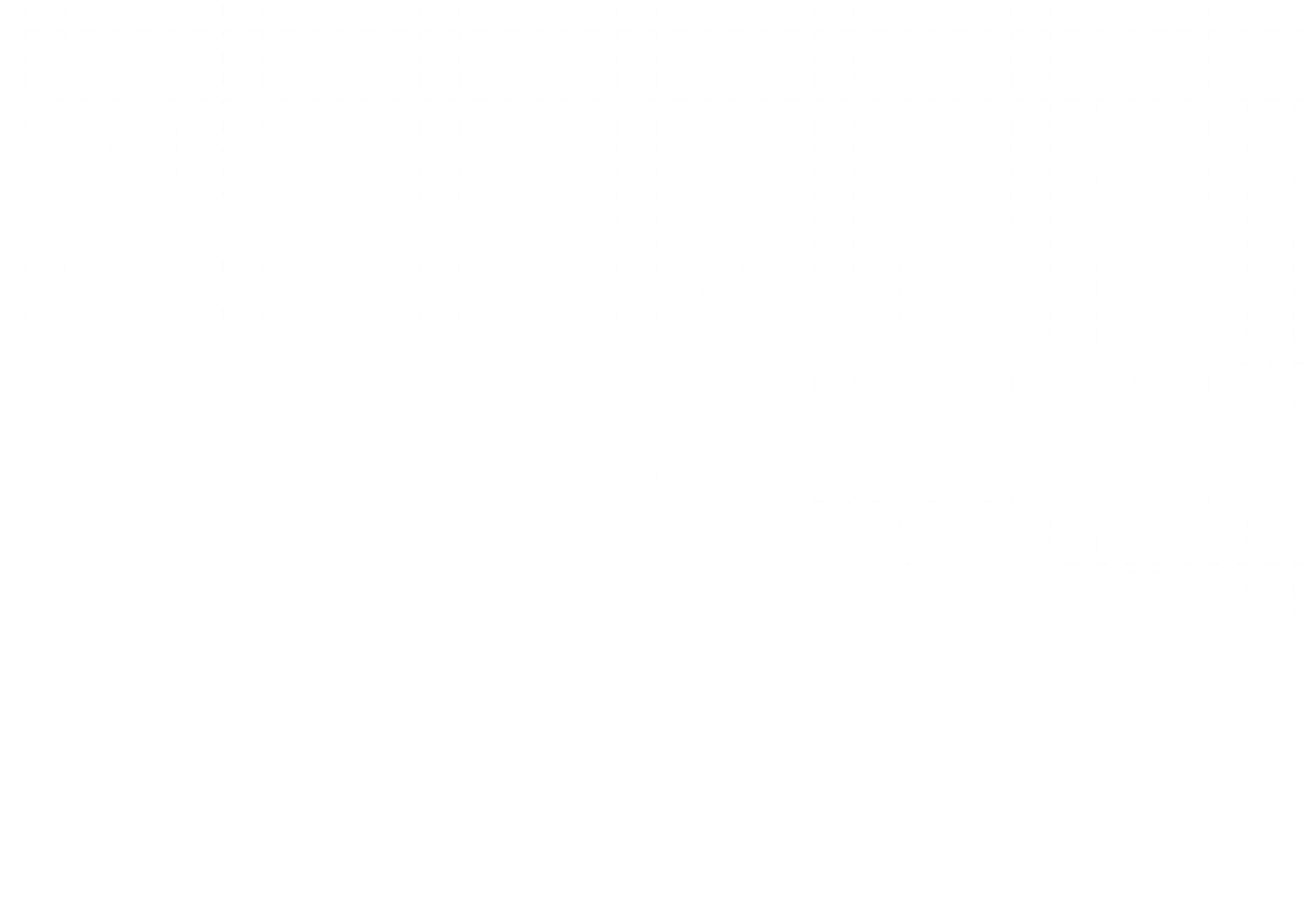 A monochrome photo of a man on a hilltop, standing confidently against a vast, open landscape.