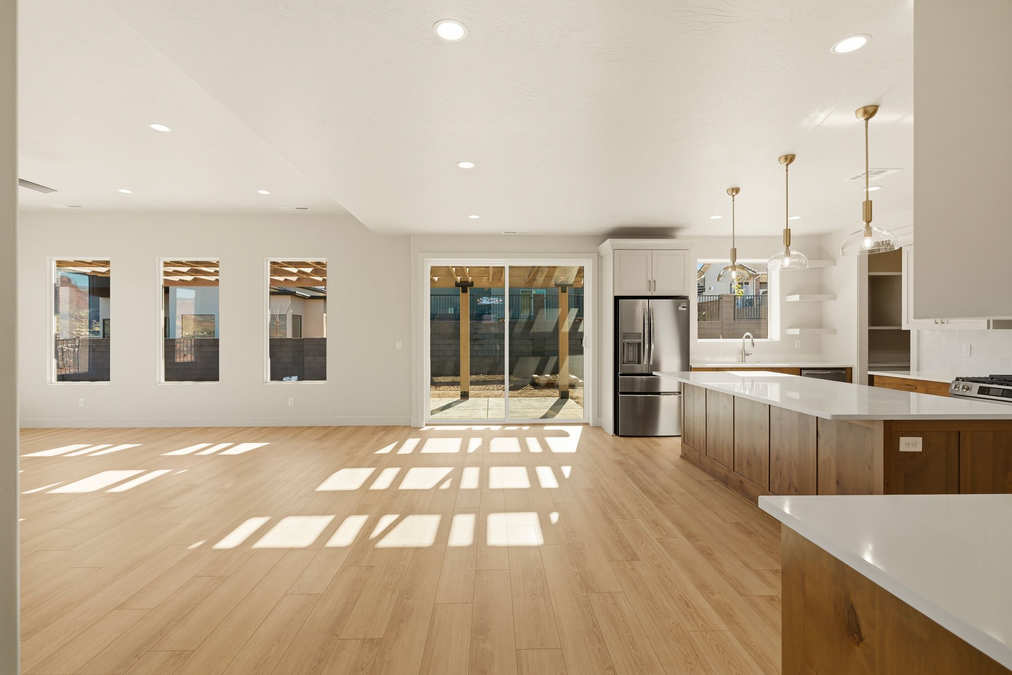 Living room space at The View at Falcon Ridge in Hurricane, Utah, highlighting design details and natural light.