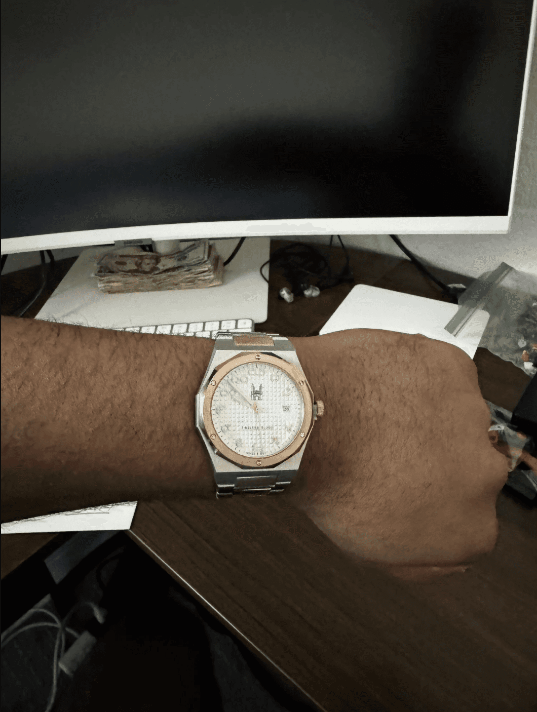 round silver-colored Rolex analog watch with link band