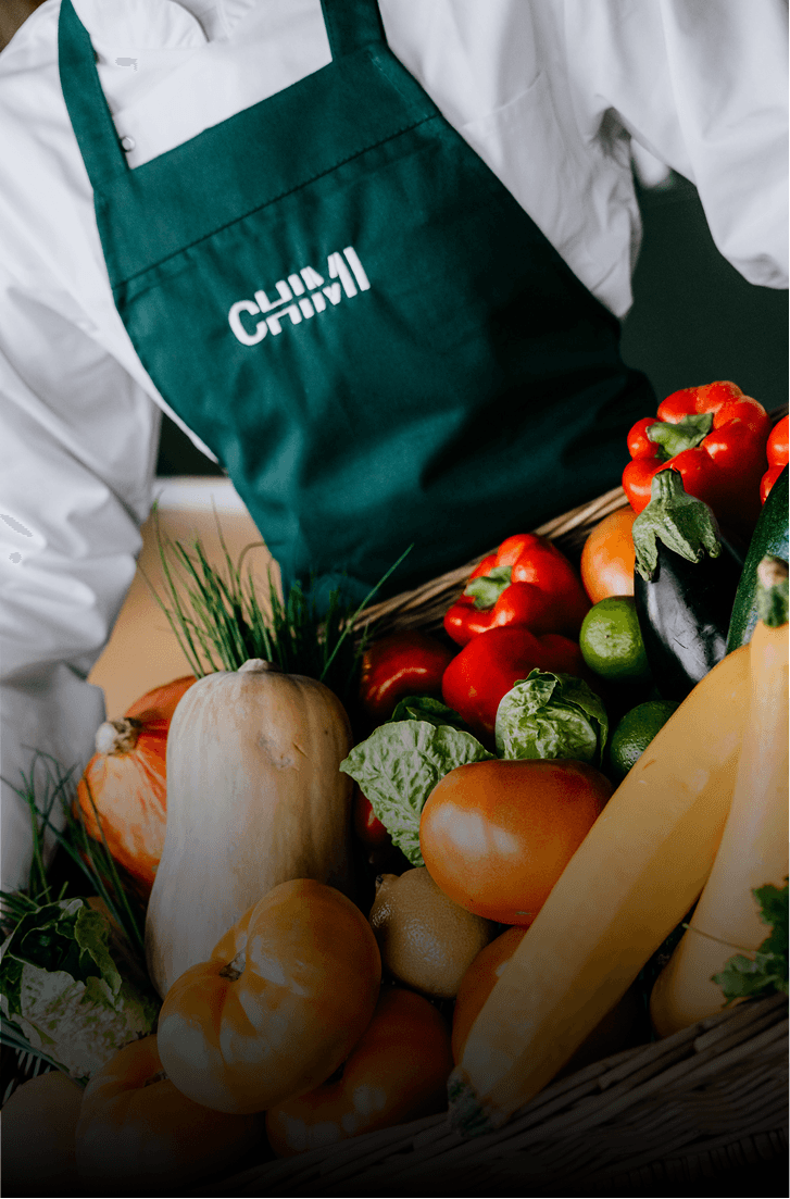 Close-up of a tree stump showing growth rings and a textured brown wood surface.