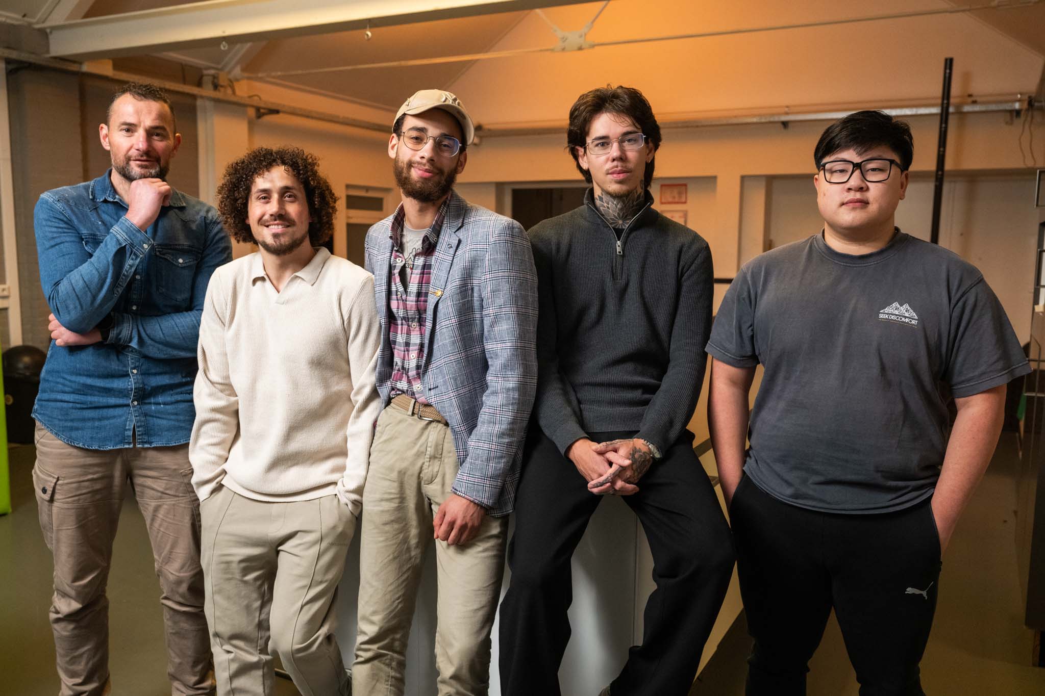 Group of people relaxing outdoors on a field or lawn