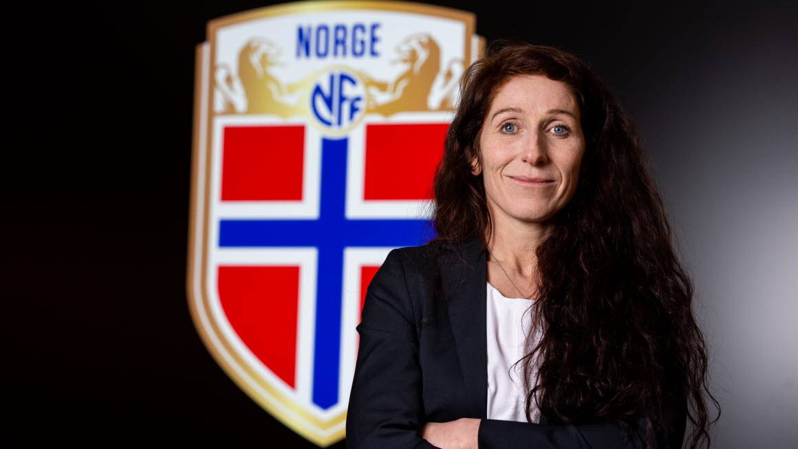 person sitting in a chair in front of a man