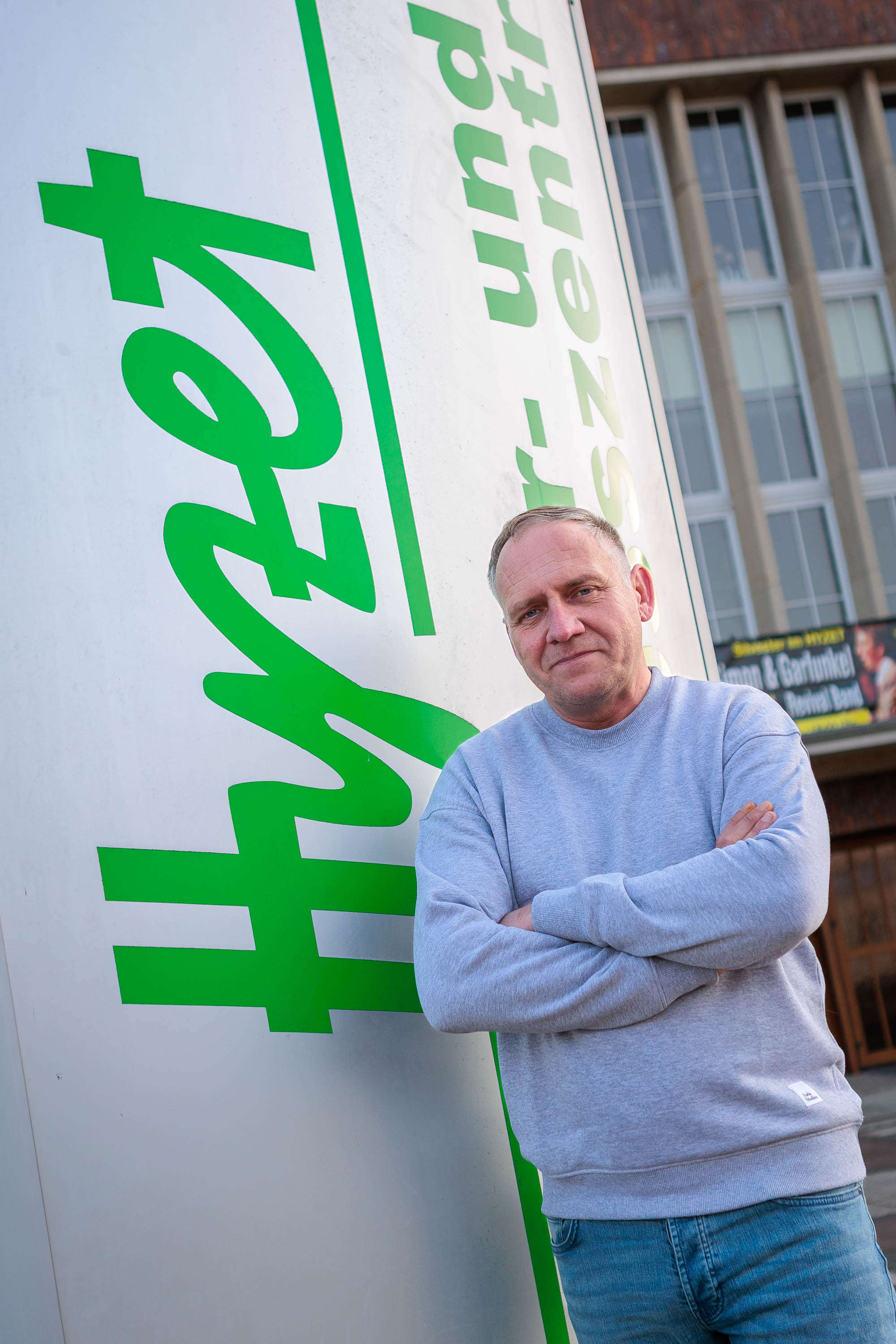 man in black hoodie standing (Background Removed)