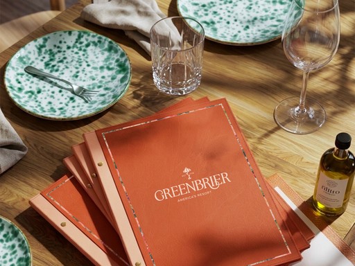 Luxurious orange leather menus for Greenbrier Resort.