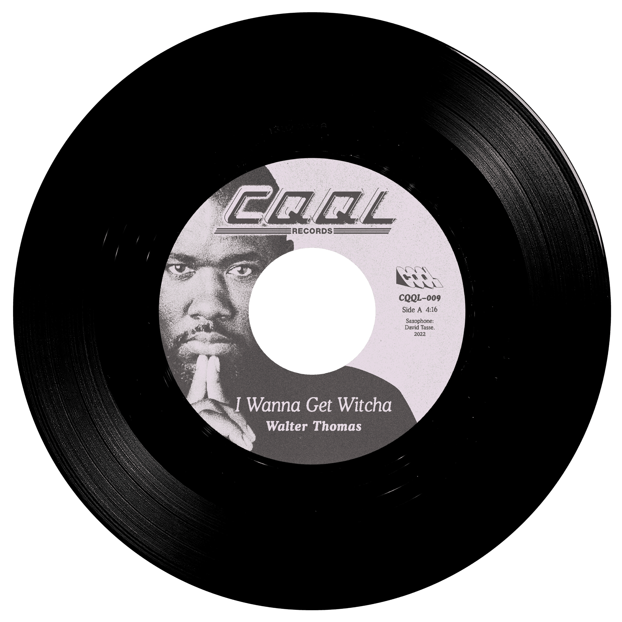 Black vinyl record with white label featuring a person's face and text