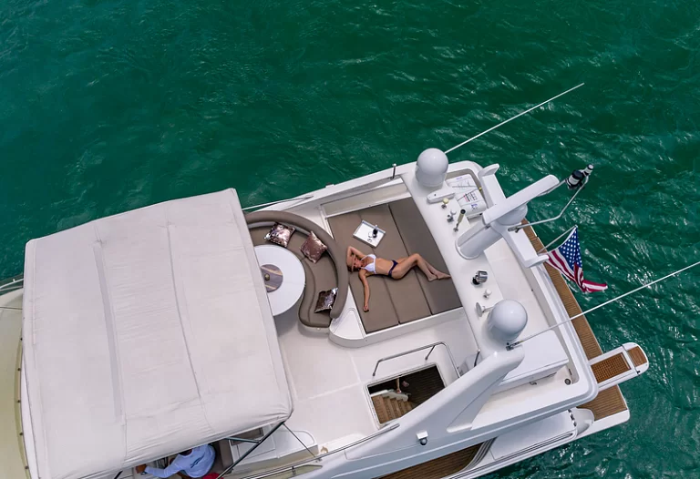 Upper deck lounge area on the Ferretti Lumar yacht, perfect for sunbathing and relaxation.