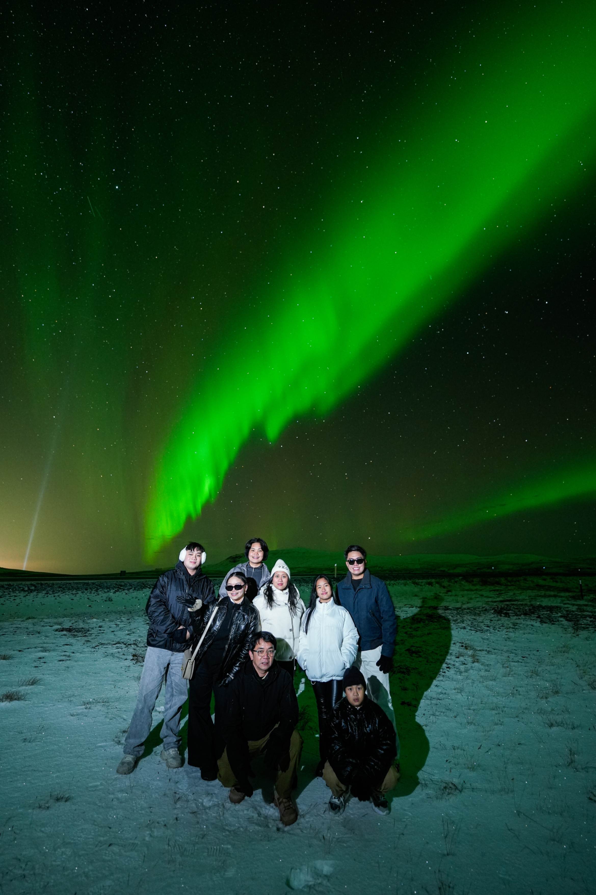 Northern Lights tour photography from Aurora Experts in Iceland, featuring guests beneath the aurora, winter landscapes, and vivid skies over remote Icelandic locations.