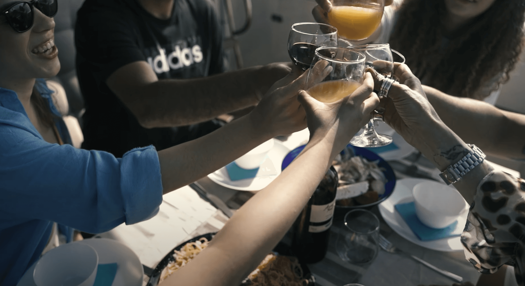 People enjoying drinks aboard Mirage in Rhodes Island 