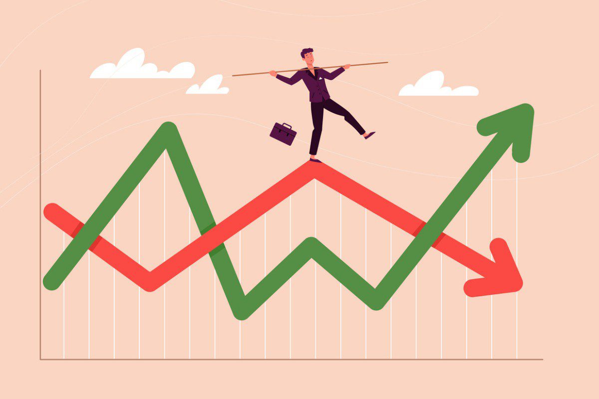 Man balancing on stock chart lines