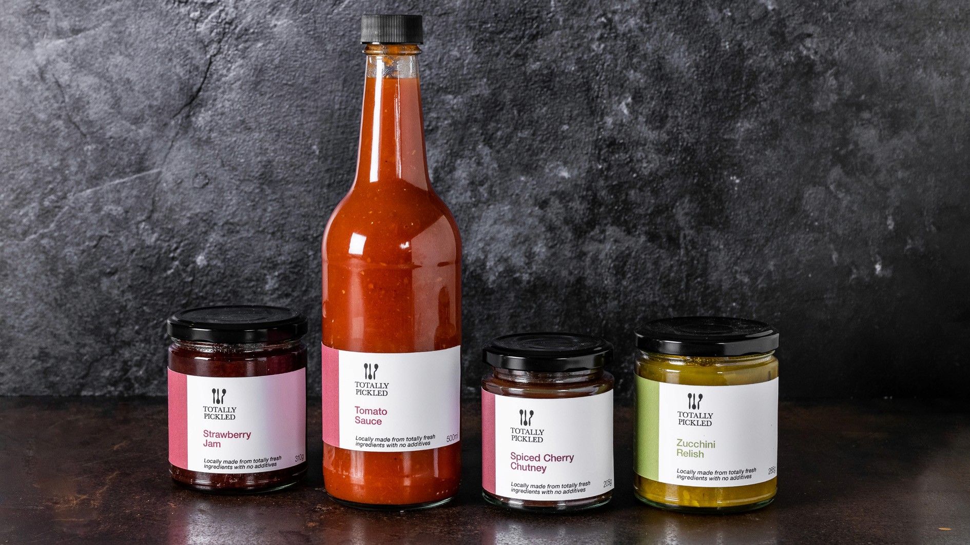 Image of full product range of pickles, jams and relishes