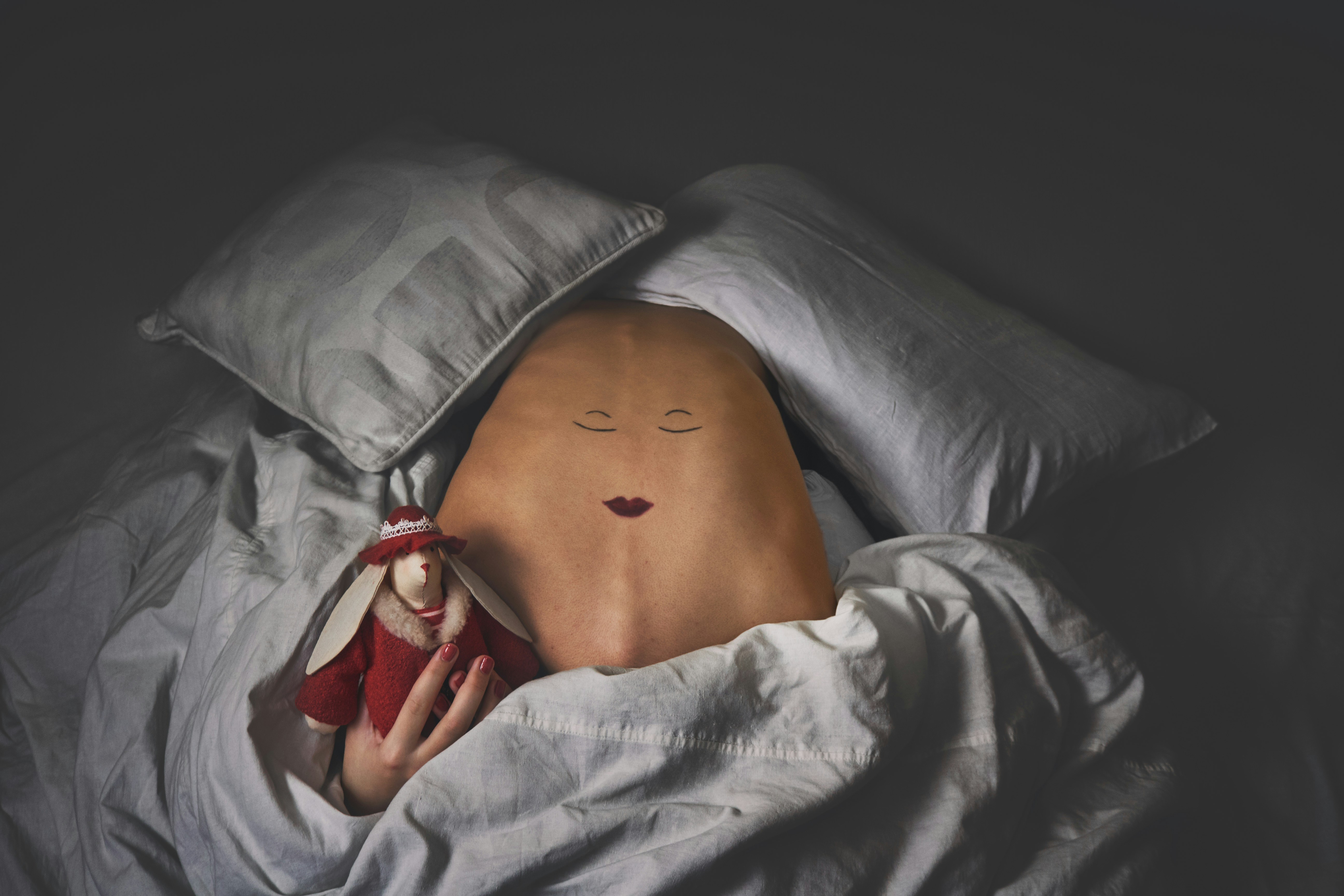 white and blue soccer ball on green grass field