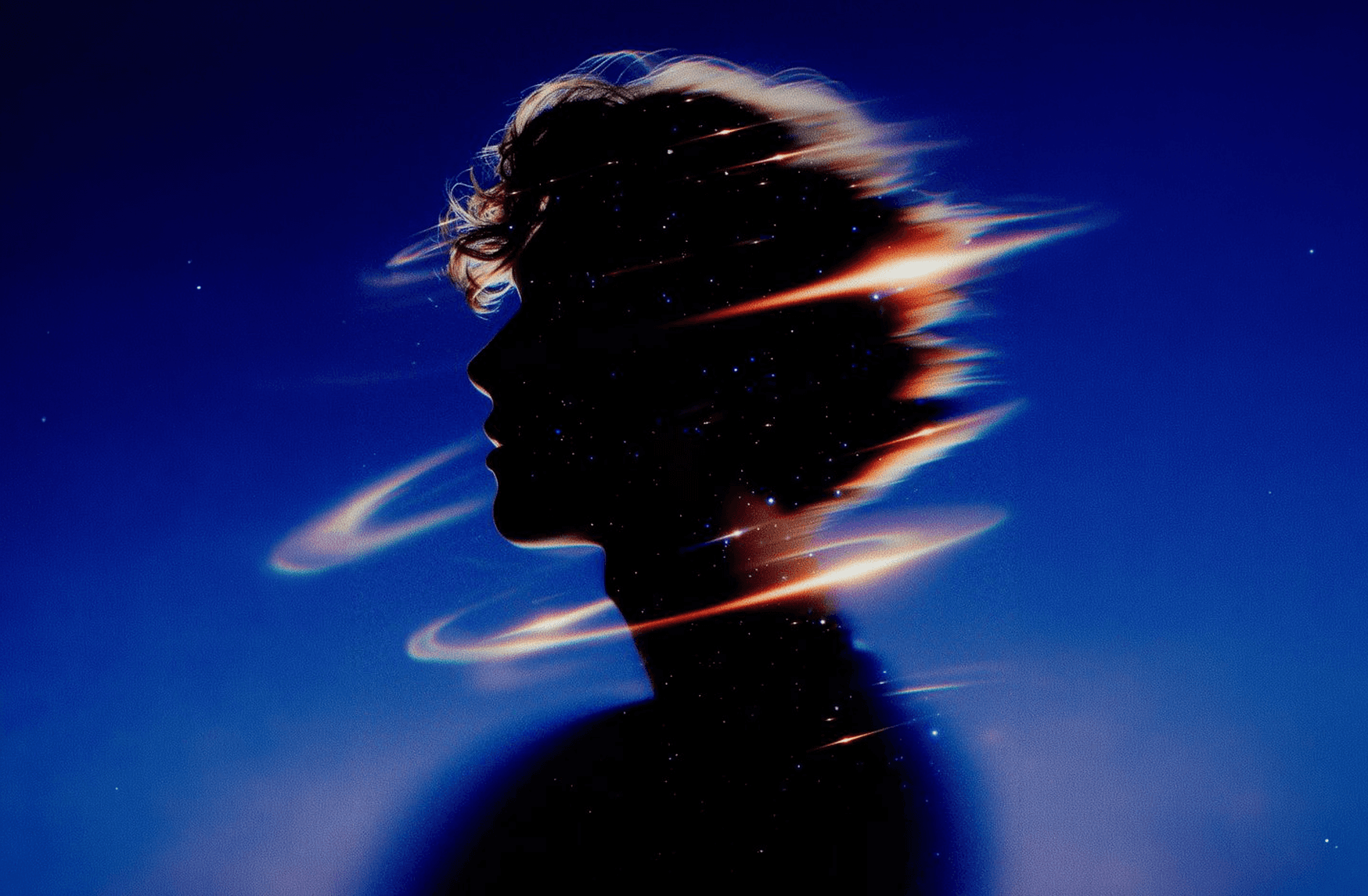 Artistic portrait with red and blue lighting creating a dramatic effect