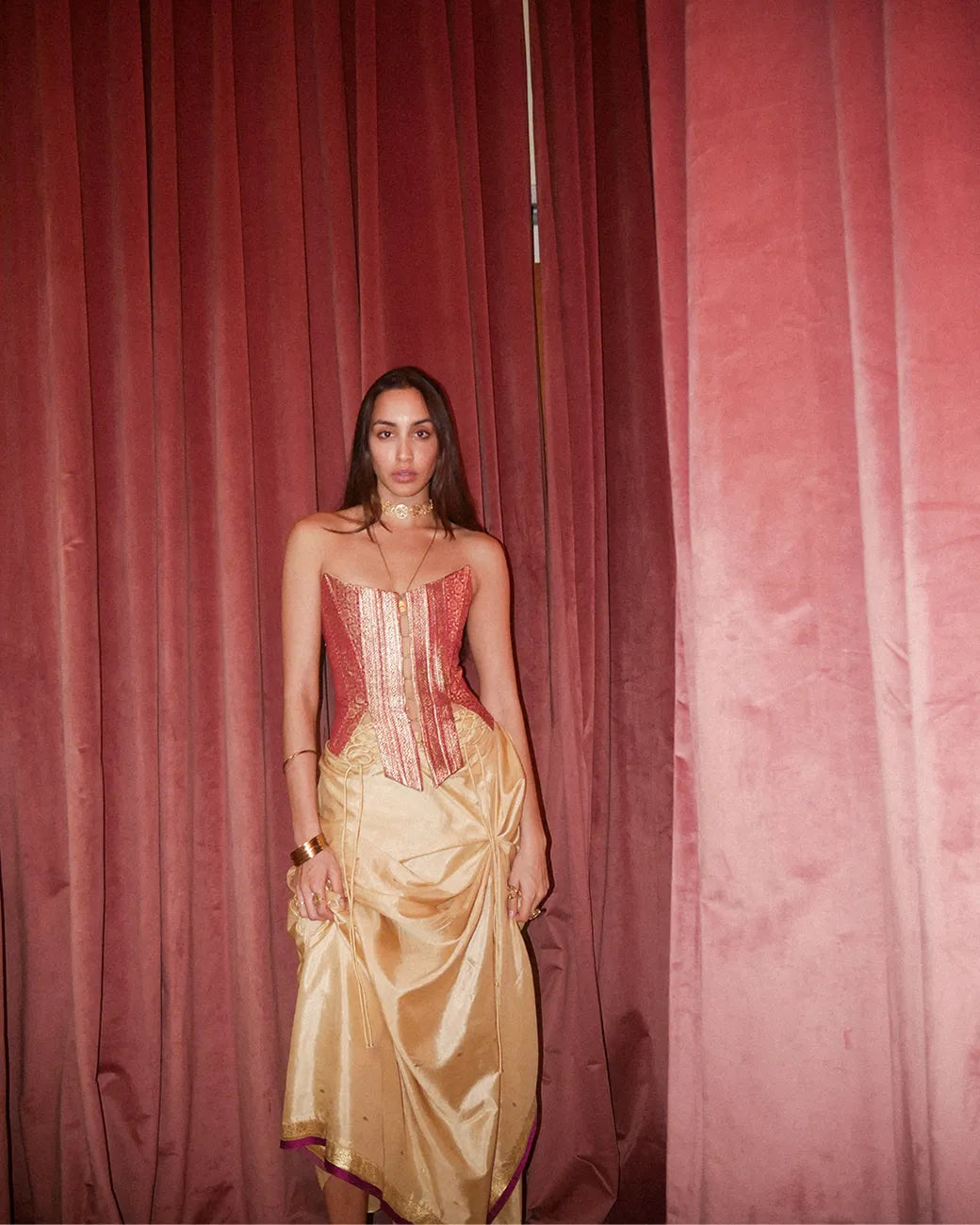 Raina is our one-of-a-kind four-panel corset, handcrafted in-house using a vintage silk saree.