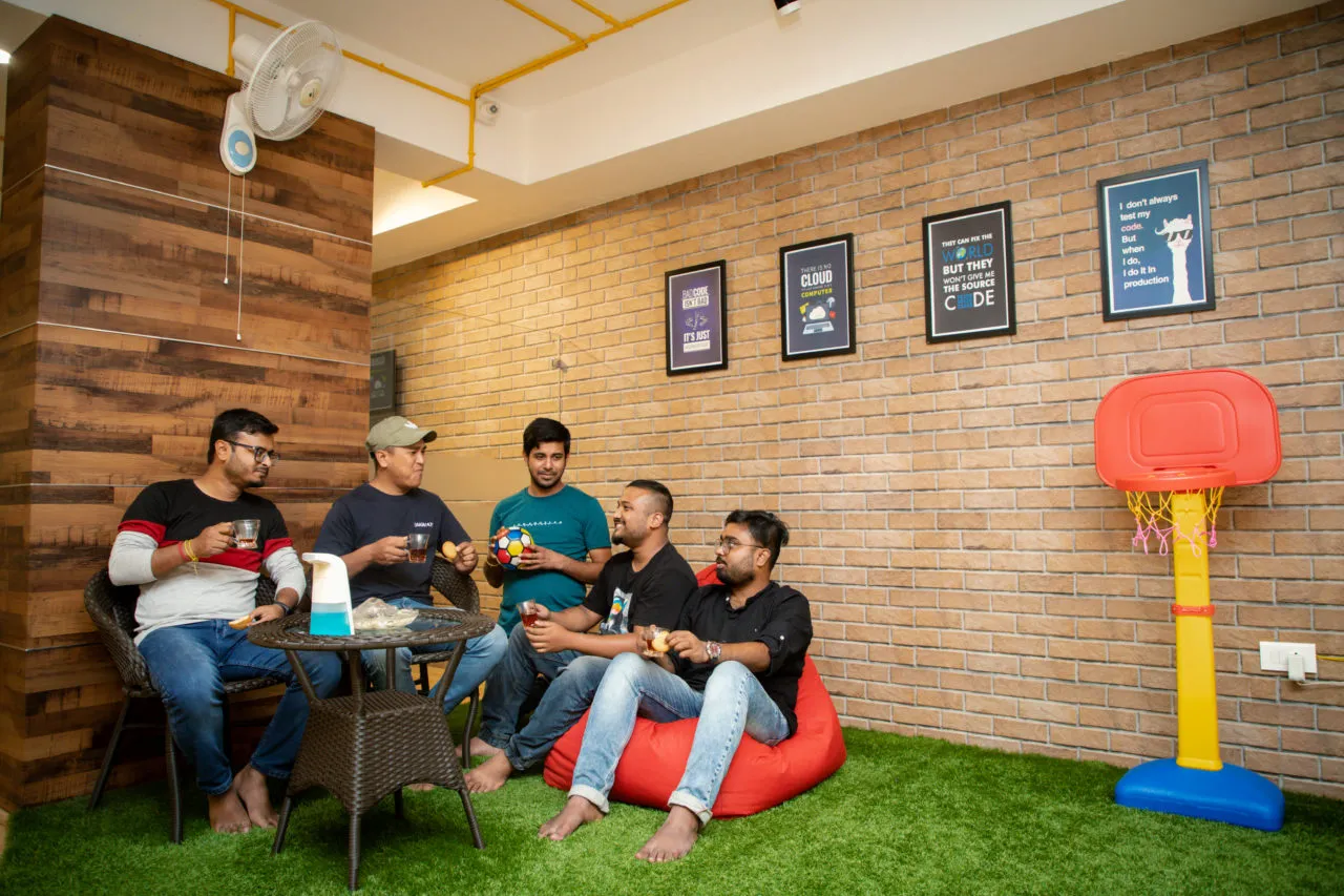 man standing near high-rise building