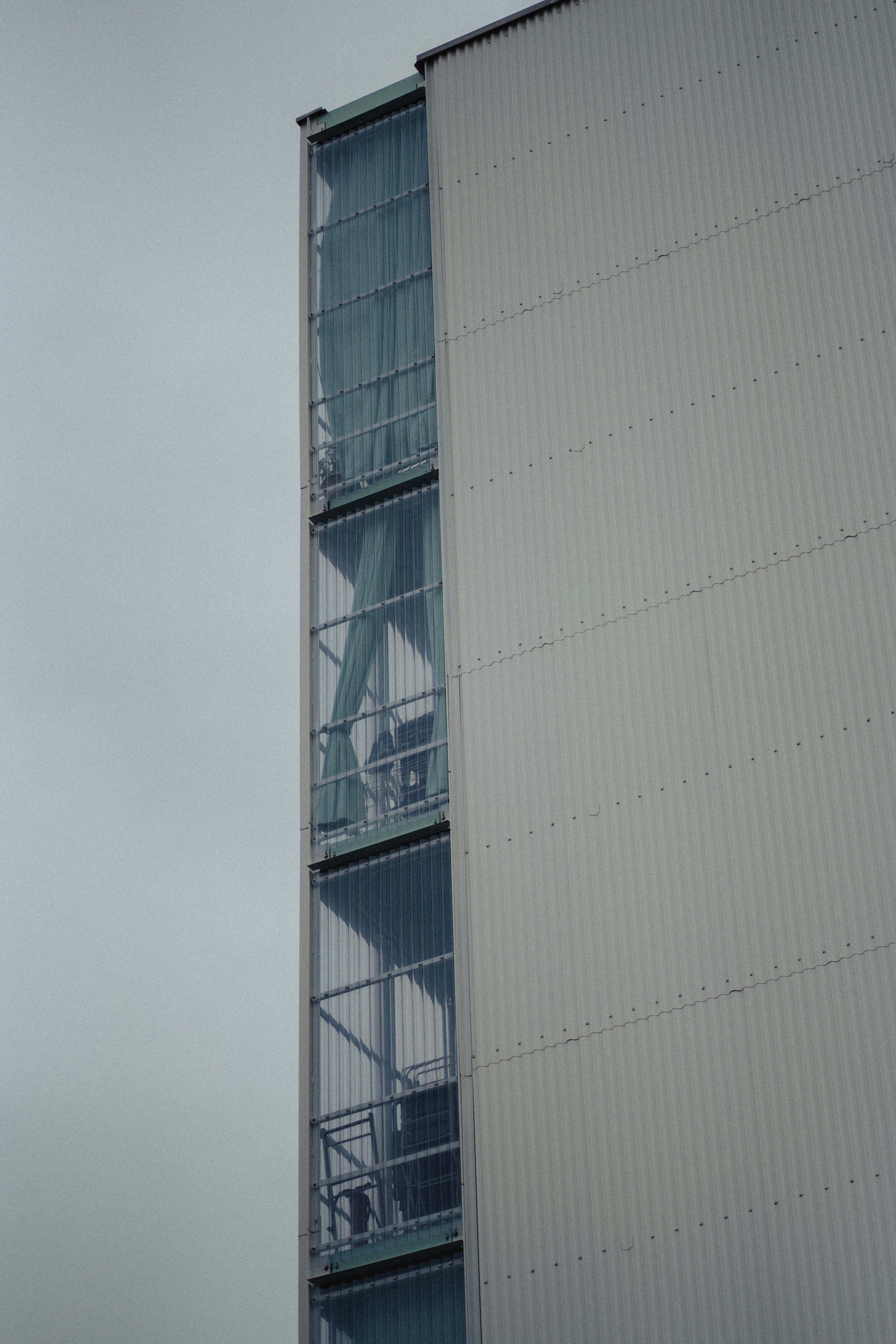 a tall building with a clock on the side of it