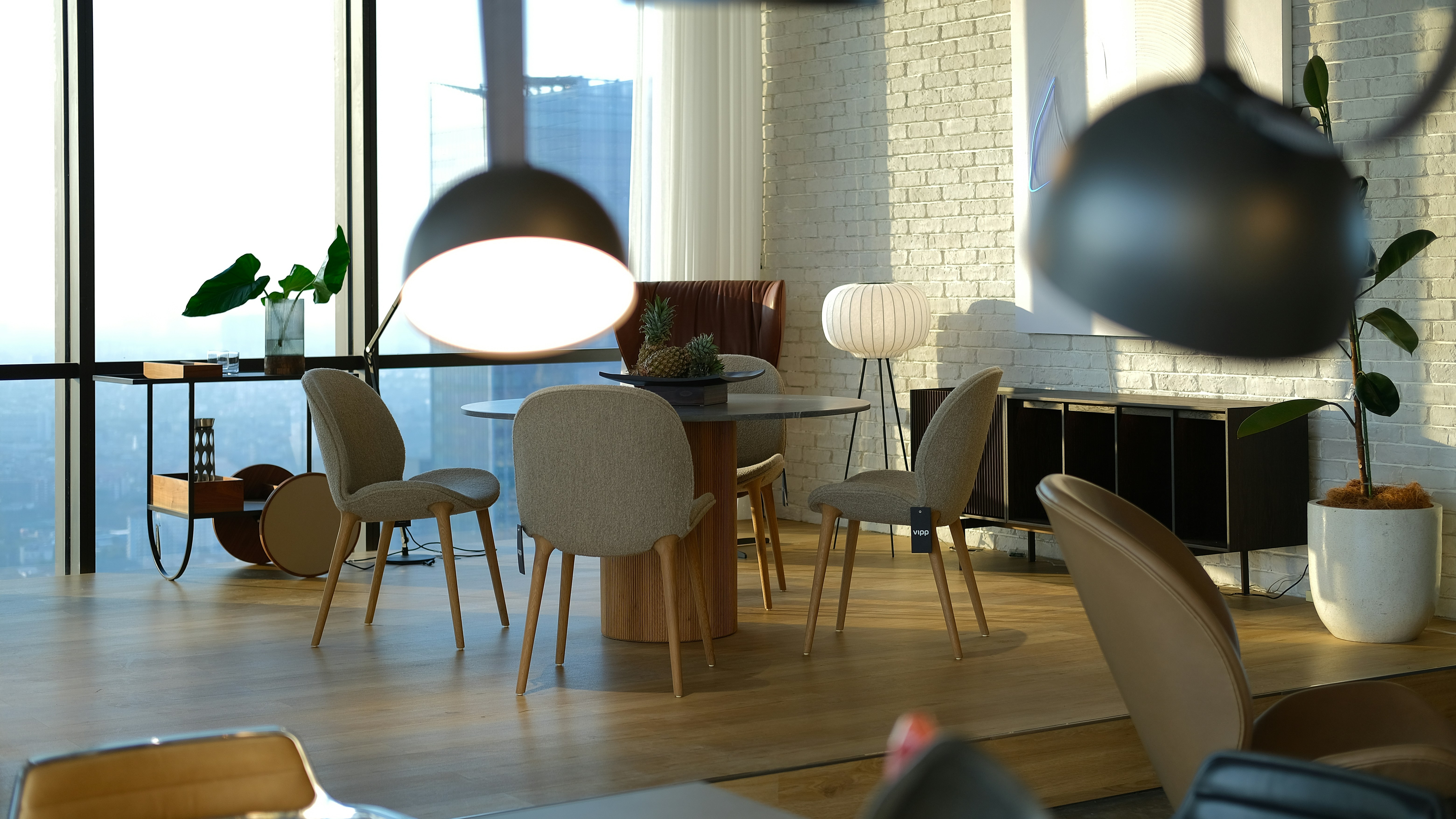 A living room filled with furniture and a large window